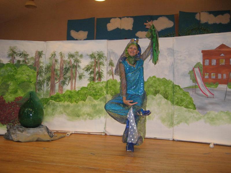 S0013_0001.jpg - Geenie Reena 
The next photos are from a performance at the Livermore Charter School on 07/17/07. This photo shows Genie Reena practicing one of the new things she has learned from reading her Genie Workbook.