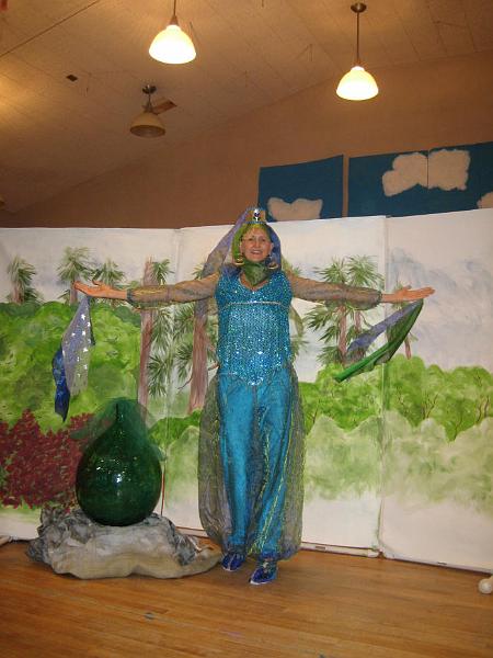 S0013_0009.jpg - Genie Reena appears 
Genie Reena appears out of the bottle as if by magic!