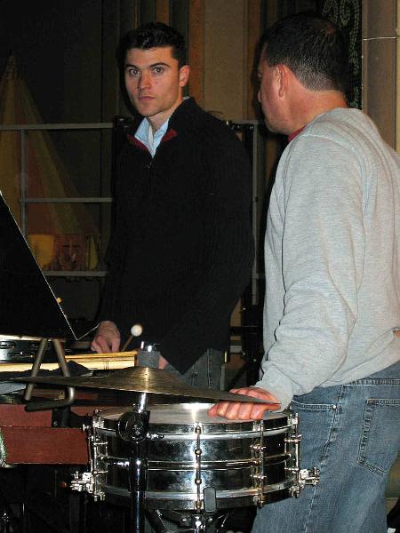 F0161_0062.jpg - Percussionists 
Ben Payson talks with Dave Dieni.